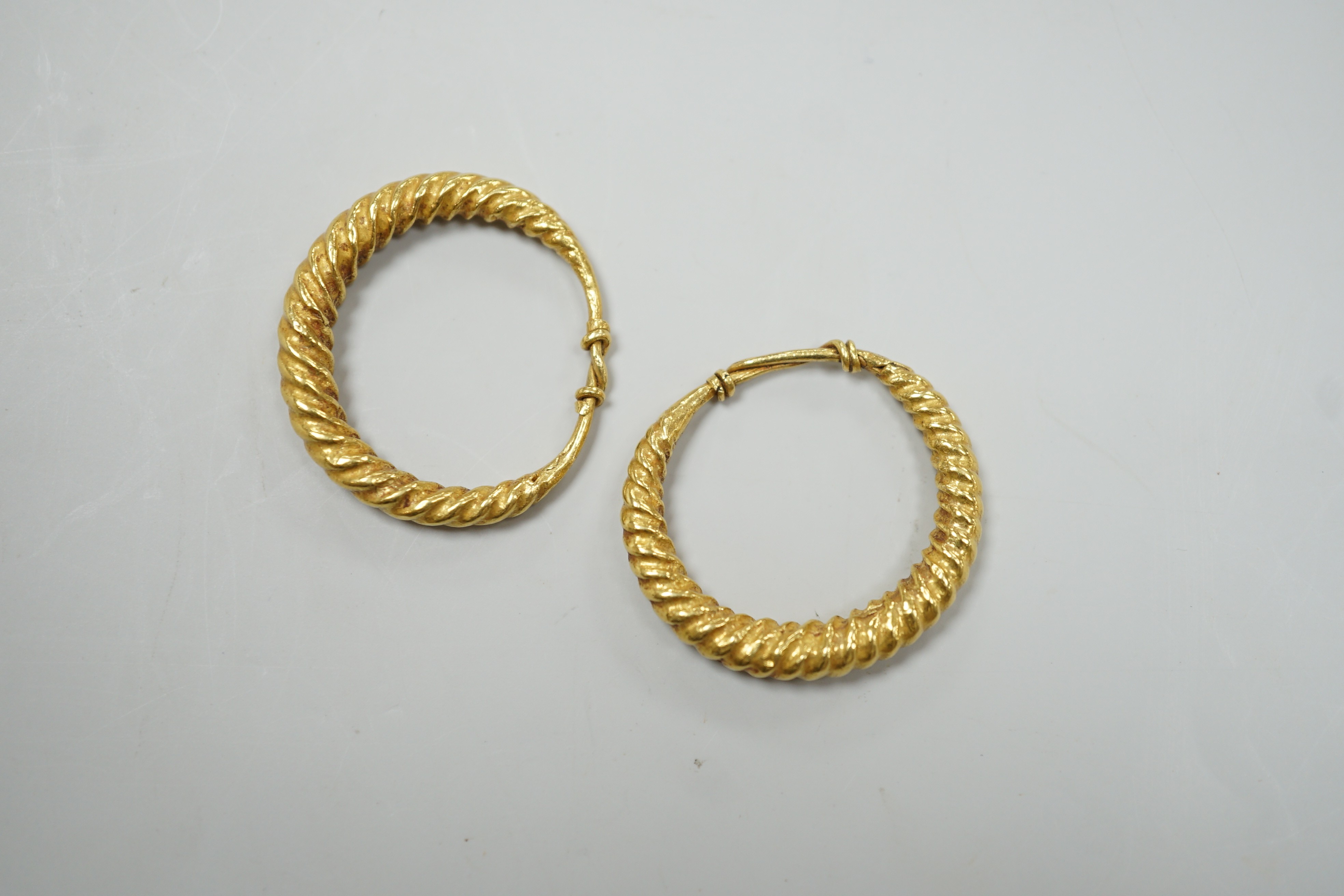 A pair of possibly Roman? yellow metal spiral twist loop earrings, 30mm, 8 grams.